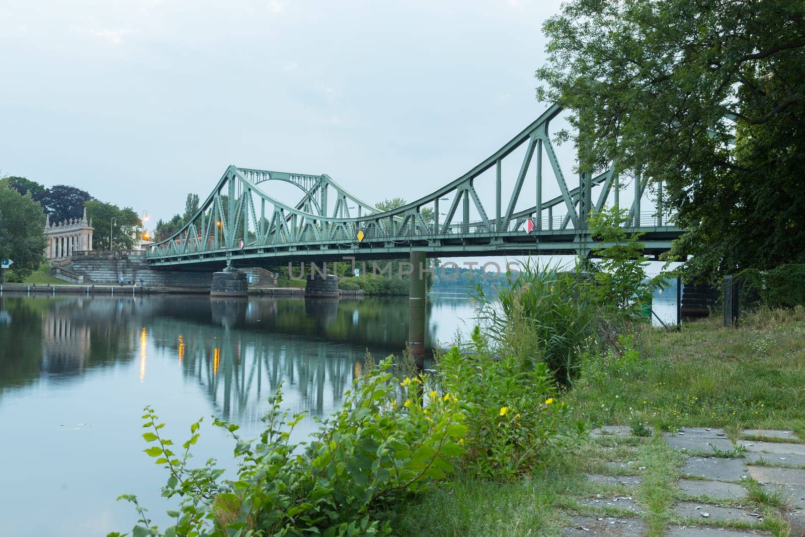 Glienicker Bridge in Potsdam in front of dark clouds