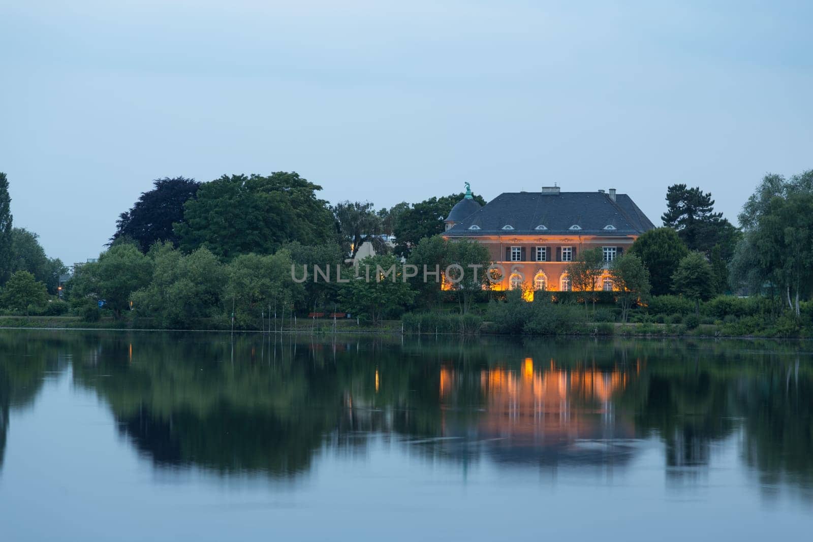 Illuminated Villa Kampffmeyer on the banks of the Havel at Glienicker Horn