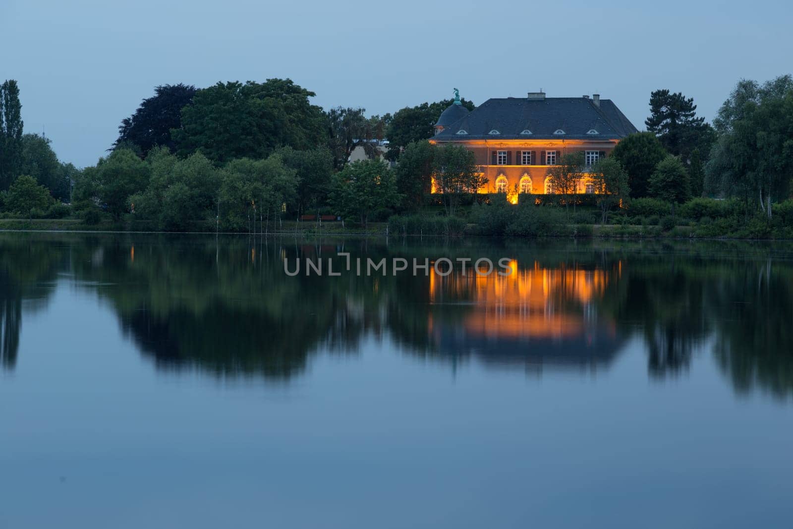Illuminated Villa Kampffmeyer on the banks of the Havel at Glienicker Horn