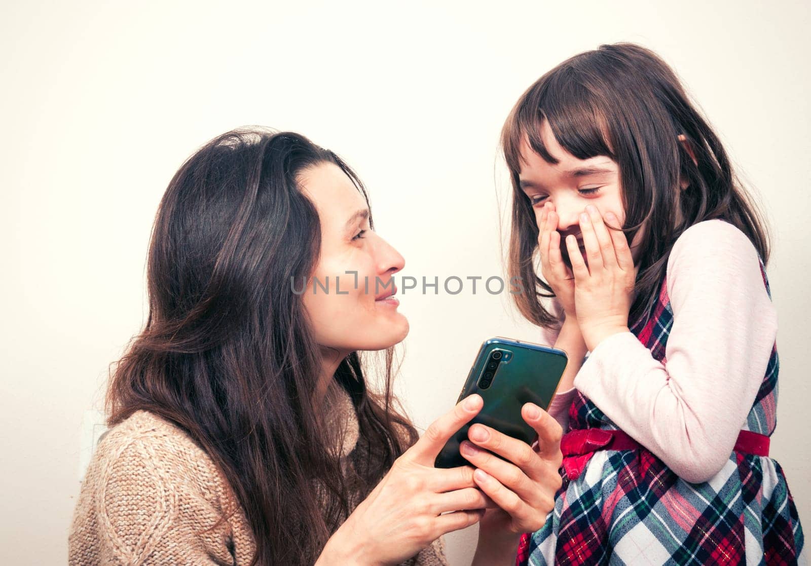 Mom with the kid and the phone