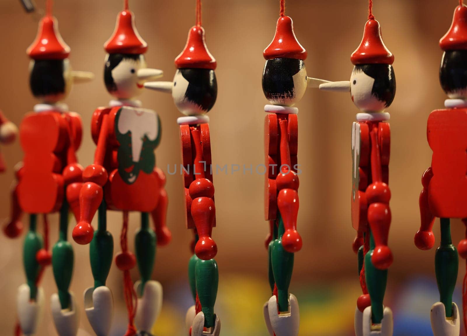 Cracow, Poland - December 19, 2021:Traditional wooden Pinocchio toy sold in souvenir shop in Cracow.