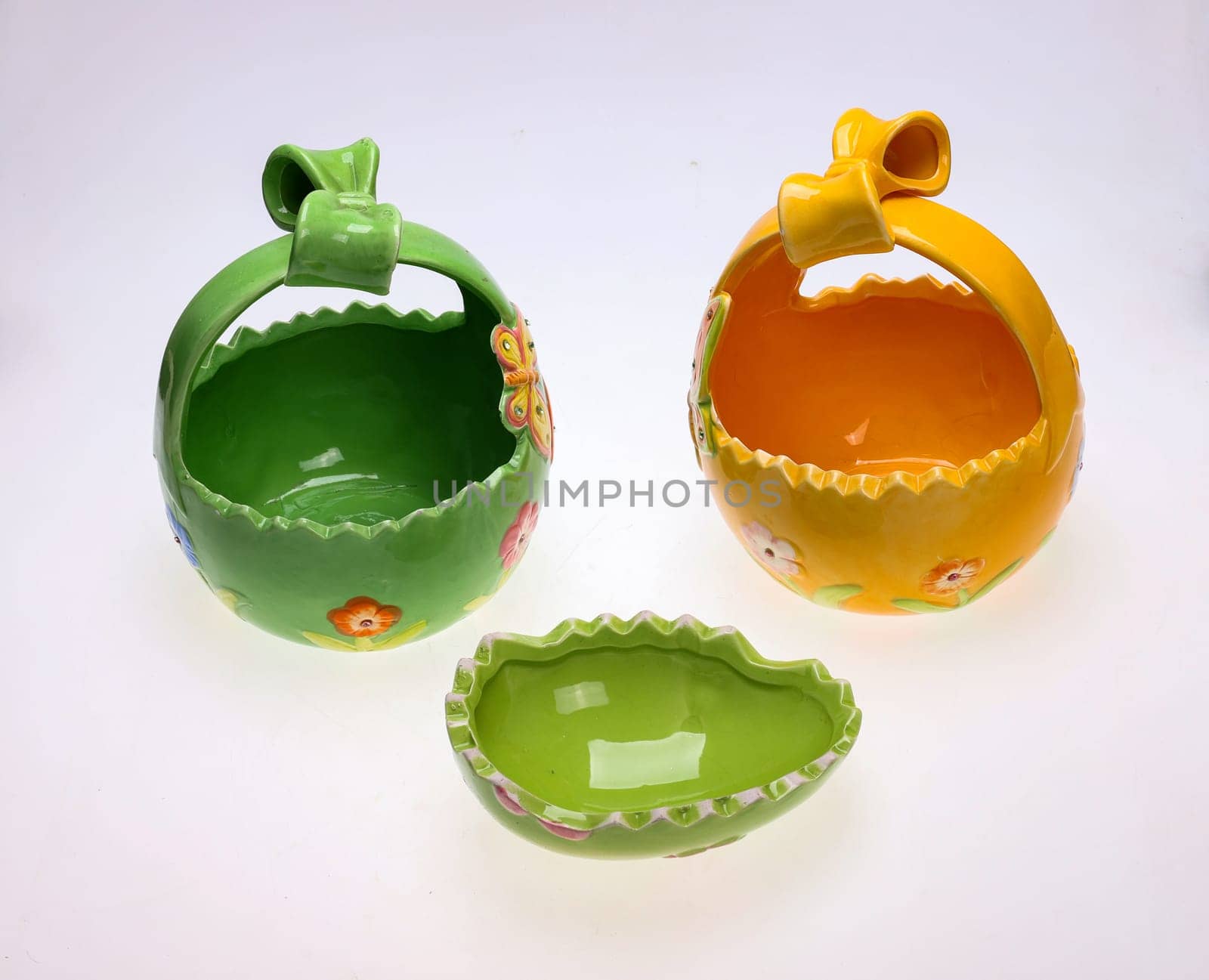 Colorful ceramic Easter decorations with butterfly motifs