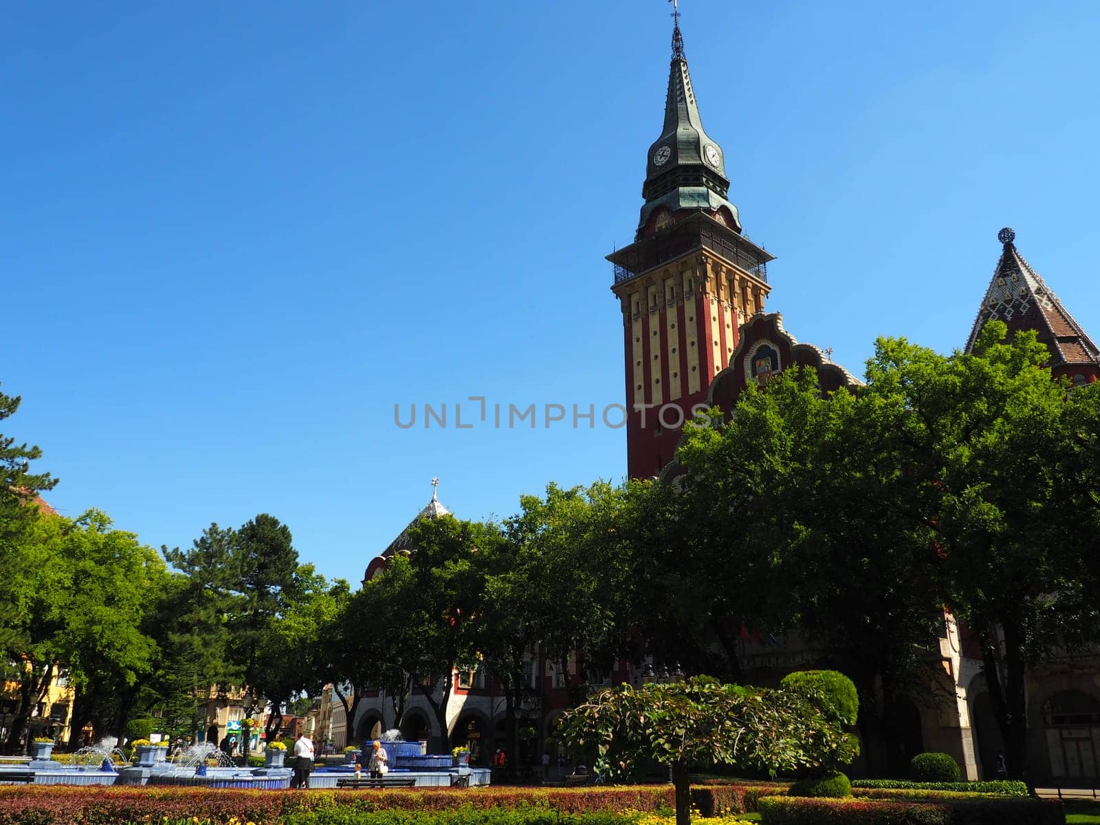 Subotica, Serbia, September 12, 2021 City Hall of Subotica szabadka in Hungarian Art Nouveau style, Vojvodina, the former territory of Austria-Hungary. People visit tourist attractions on a summer day