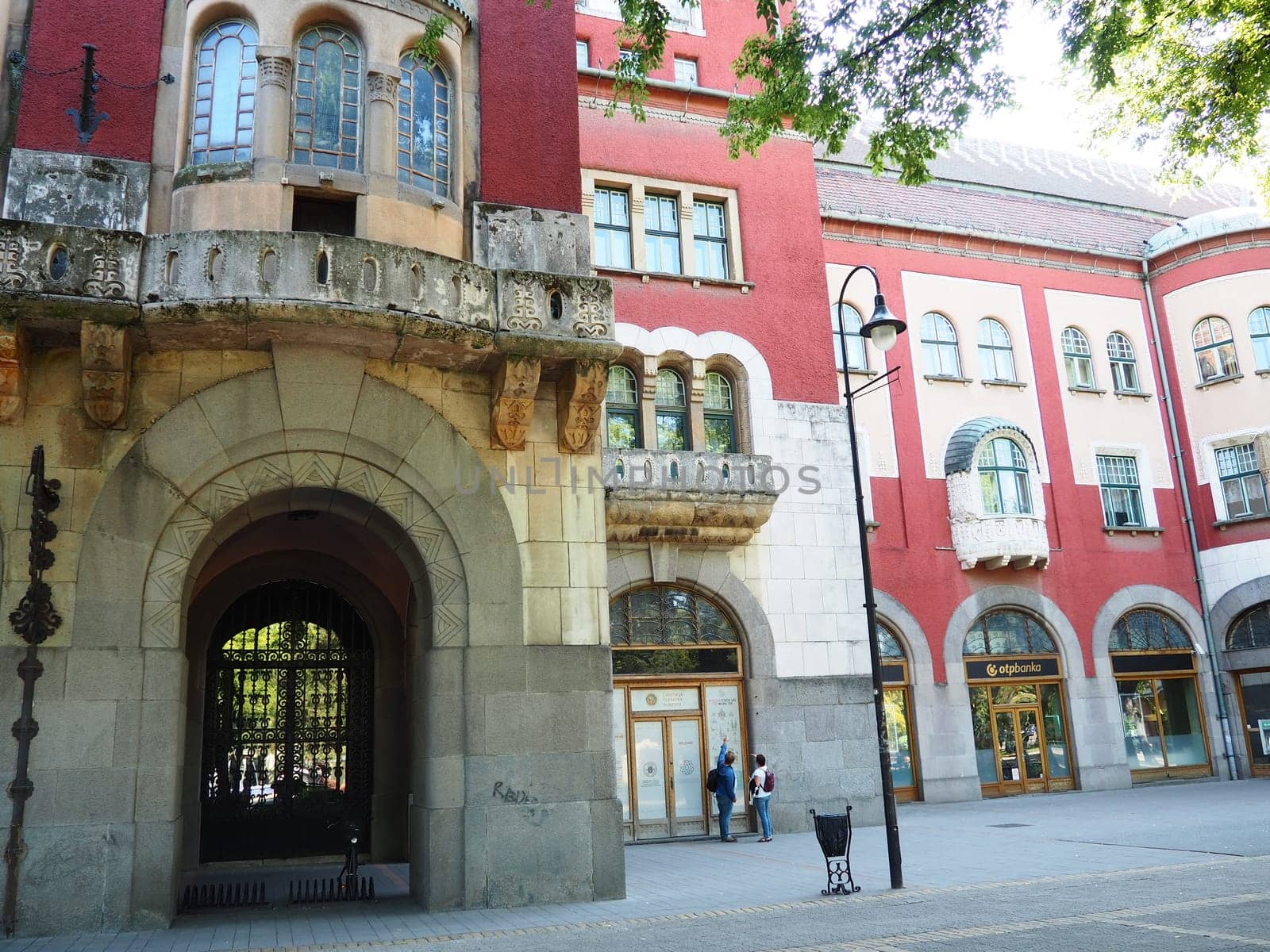 Subotica, Serbia, September 12 2021 City Hall of Subotica szabadka in Hungarian Art Nouveau style, Vojvodina, the former territory of Austria-Hungary. People visit tourist attractions on a summer day.