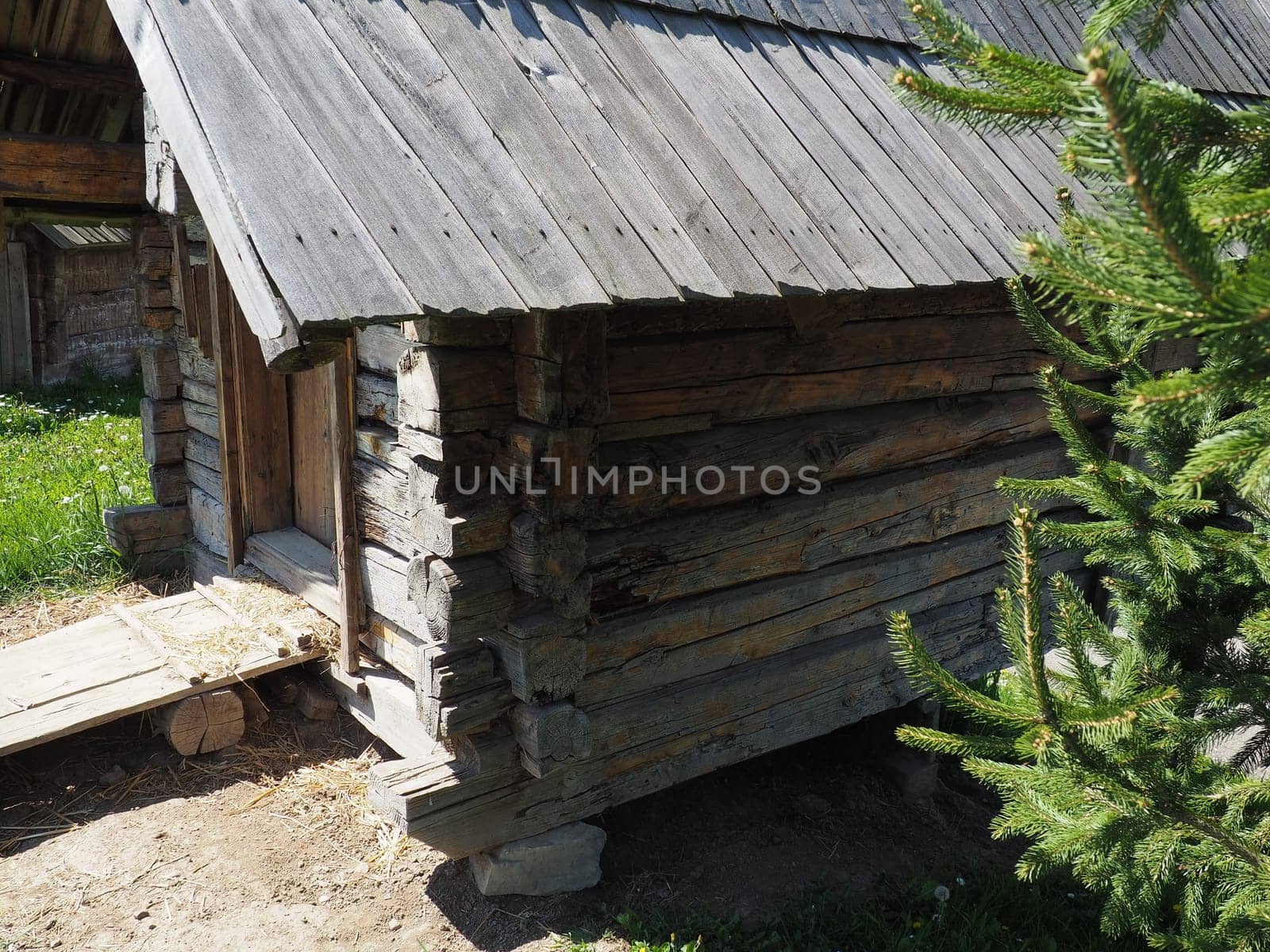 Log village farmhouse. 19th century Bosnian mountain traditional dwelling. Restored ethno building. The old way of village life. House of the witch in the woods.