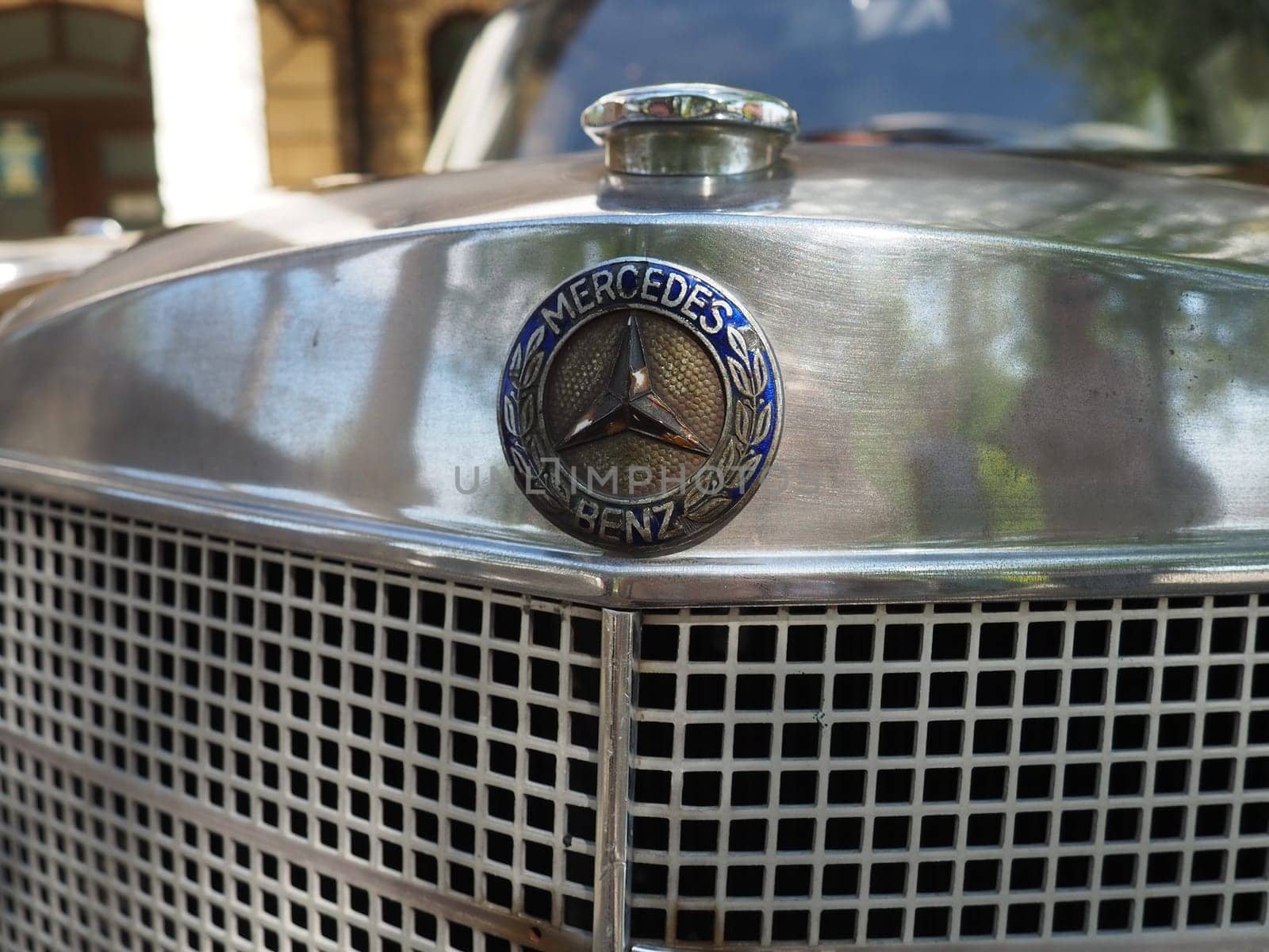 Stanisici, Bijelina, Bosnia and Herzegovina, April 25, 2021. Mercedes Benz pontoon, retro car. Cover of the engine compartment of the car. Part of the body with a metal grille from the engine