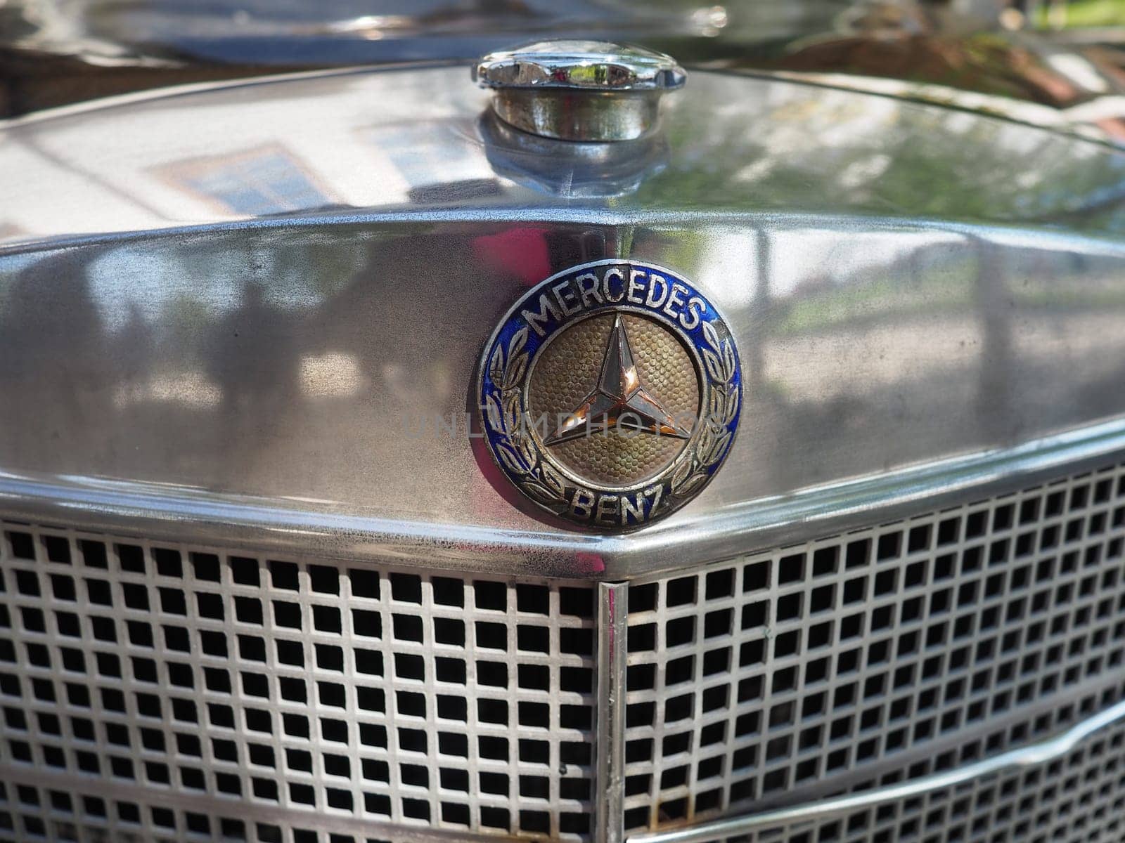 Stanisici, Bijelina, Bosnia and Herzegovina, April 25, 2021. Mercedes Benz pontoon, retro car. Cover of the engine compartment of the car. Part of the body with a metal grille from the engine