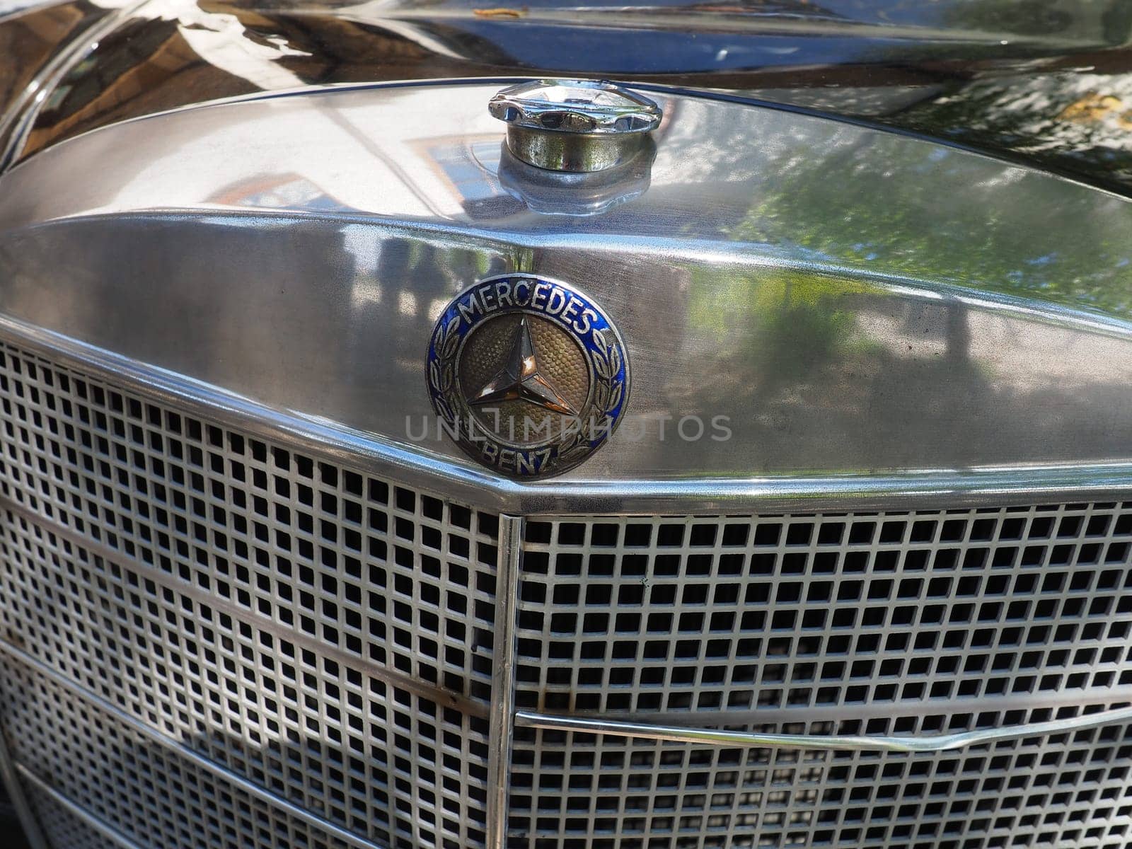Stanisici, Bijelina, Bosnia and Herzegovina, April 25, 2021. Mercedes Benz pontoon, retro car. Cover of the engine compartment of the car. Part of the body with a metal grille from the engine