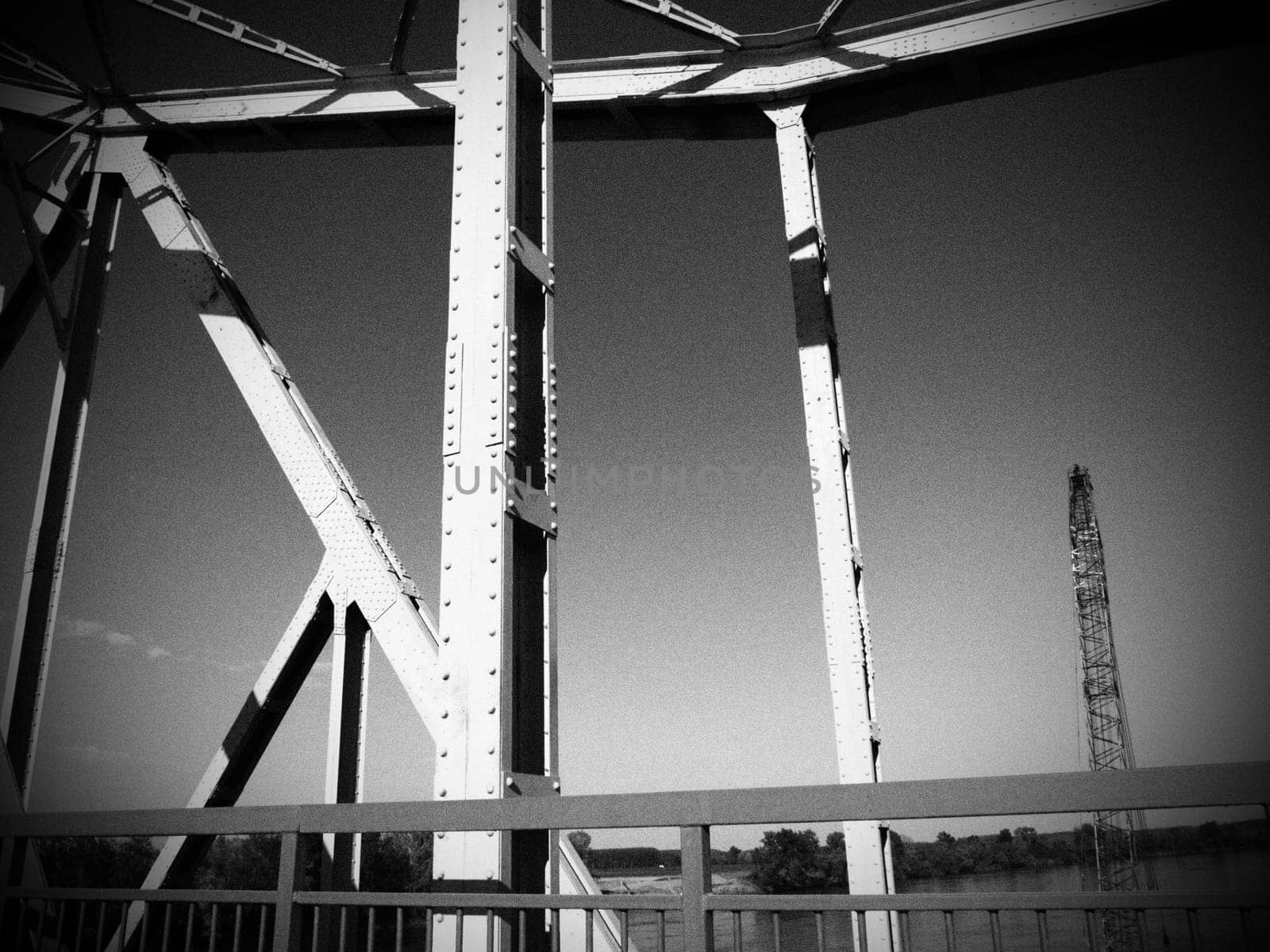 The bridge on the river Sava. Part of the construction of the metal iron bridge. Modern technological beams.