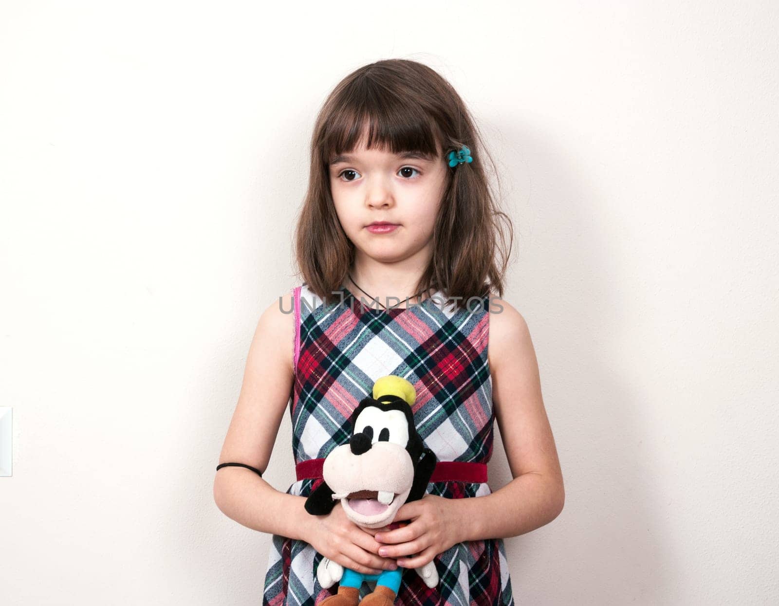 Child girl with the toy