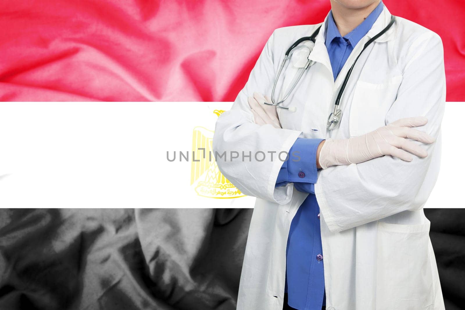 Doctor standing with the flag