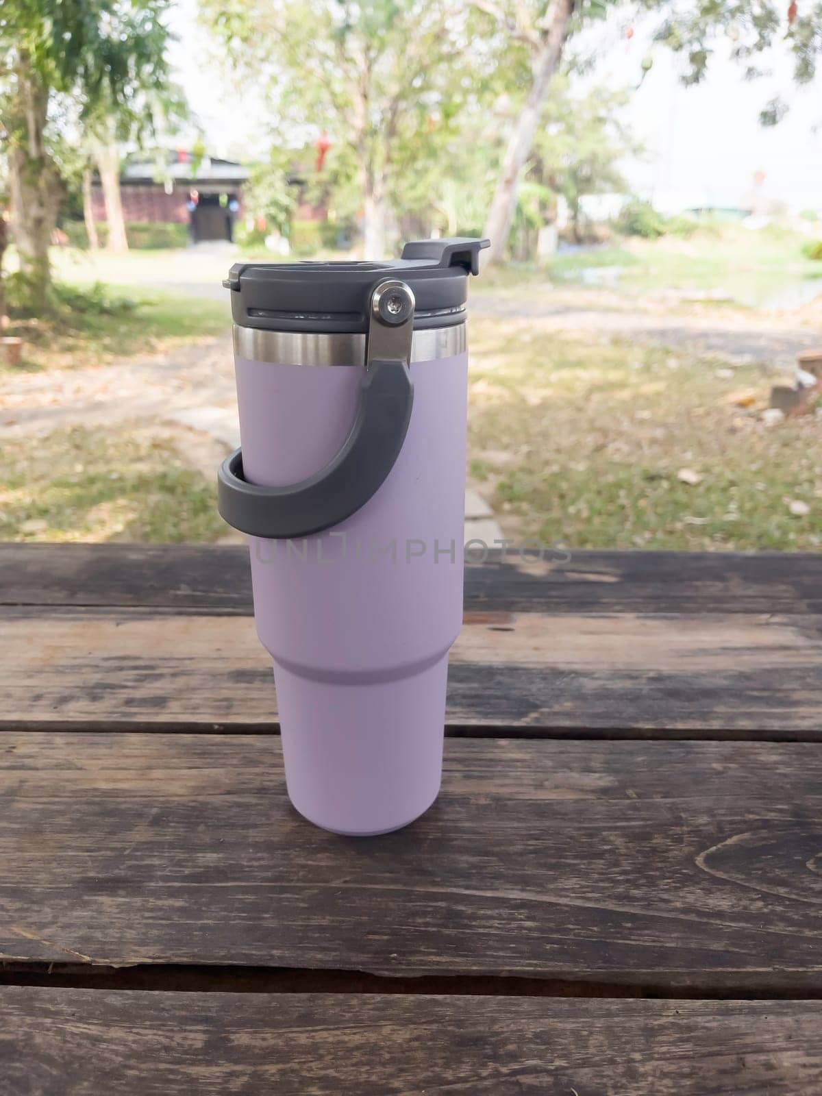 Reusable steel thermal water cup, stock photo