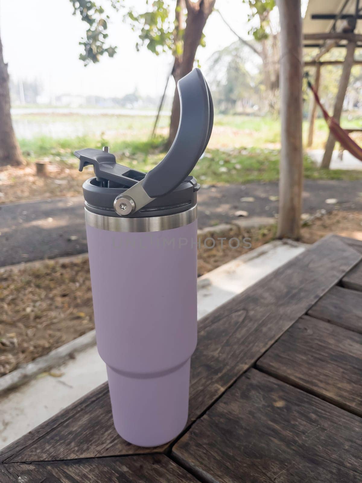 Reusable steel thermal water cup, stock photo