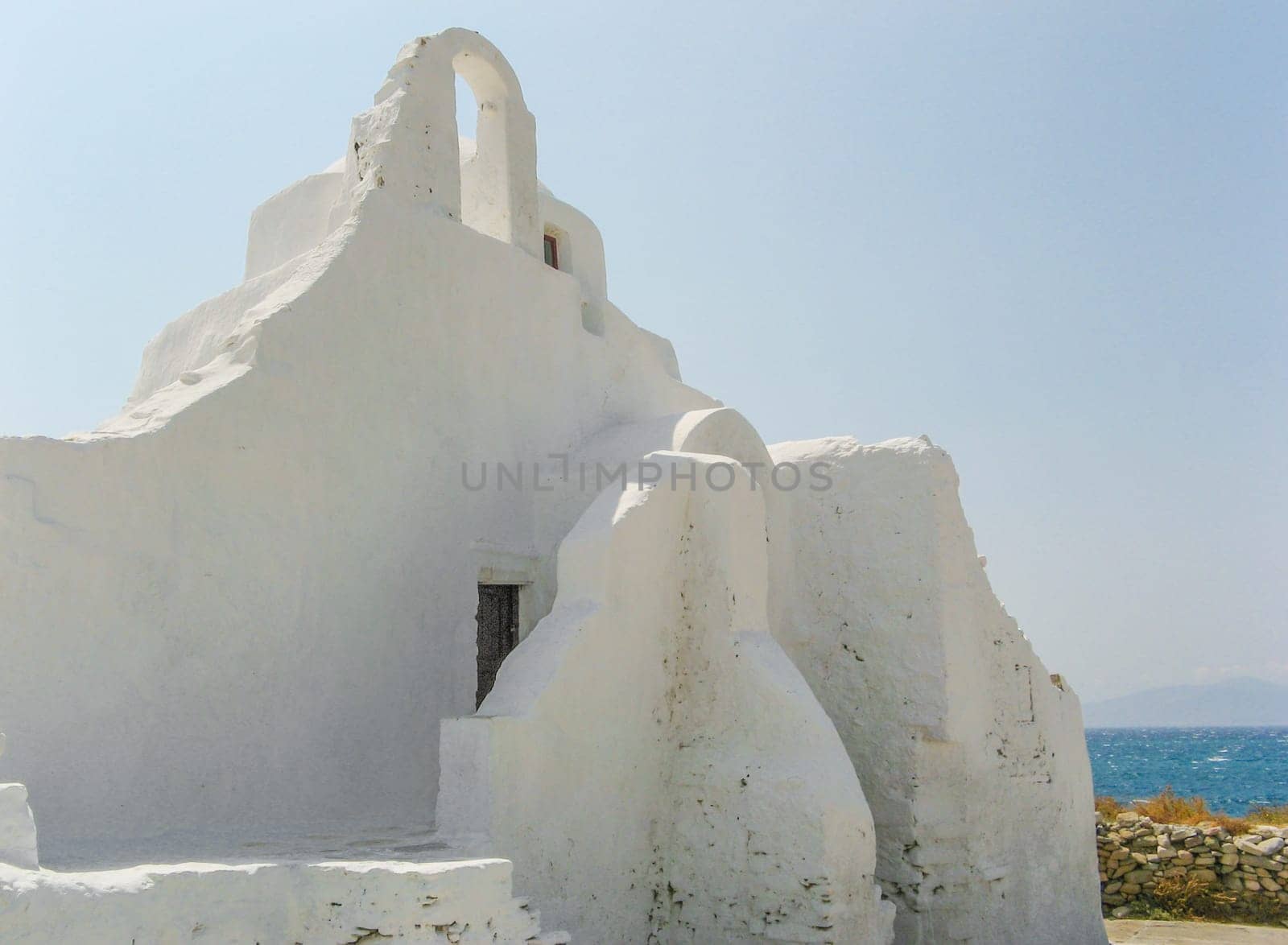 The view of the famous church of Panagia Paraportiani situated in the main town of Chora, Mykonos island, Cyclades, Greece