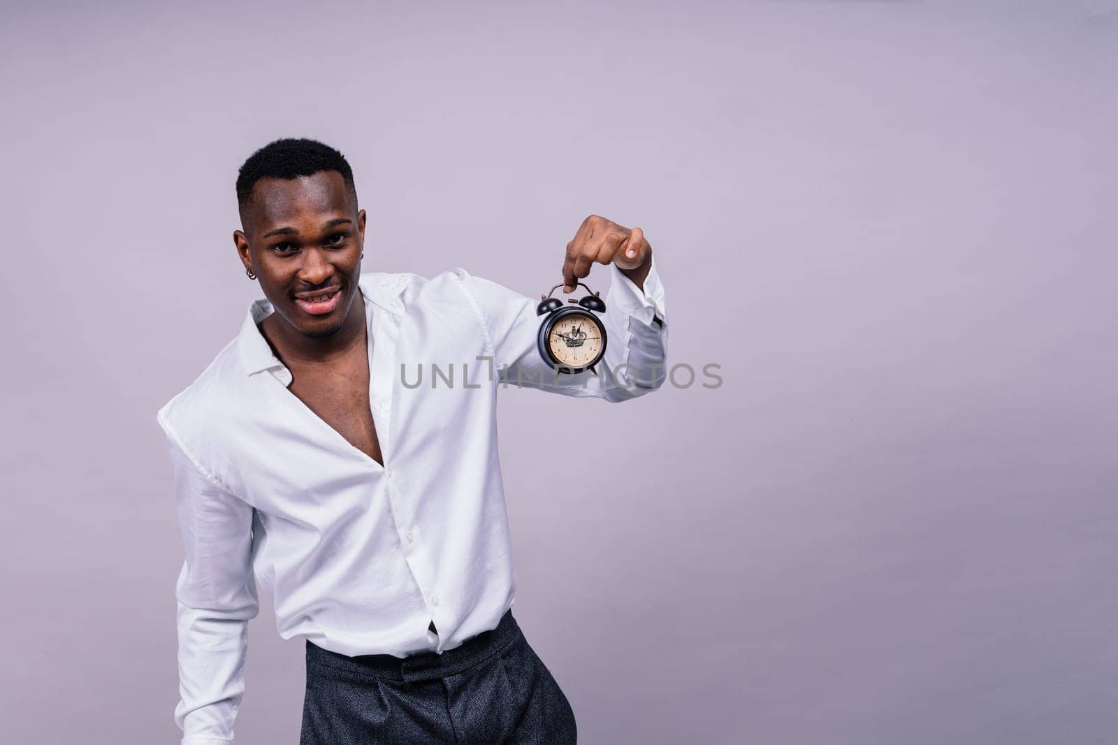 Happy african american young businessman in a formal suit. Smiling confident black guy