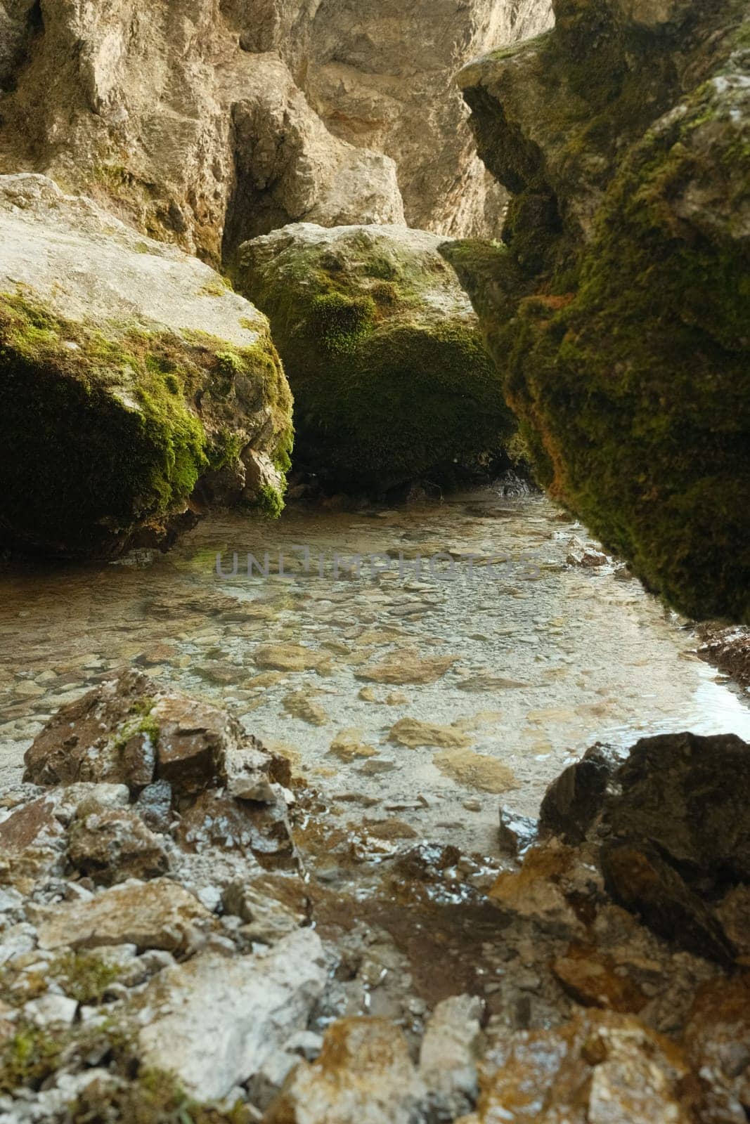 Crystal clear blue water at the Birnbachloch spring near Leogang, Austria