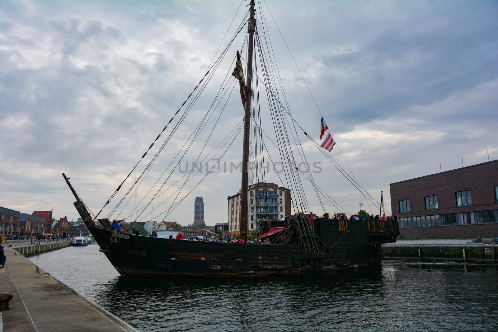 Wismar, Germany, September 10, 2022 - seaport and a Viking excursion ship in the historic Hanseatic city of Wismar, on the Baltic Sea coast Mecklenburg -Western Pomerania in Germany