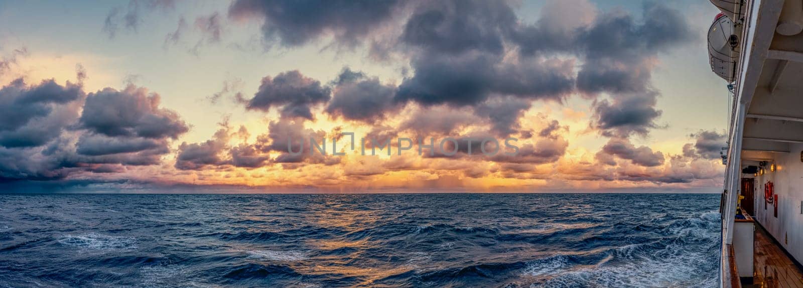 dreamlike sunset panorama on the open wide sea