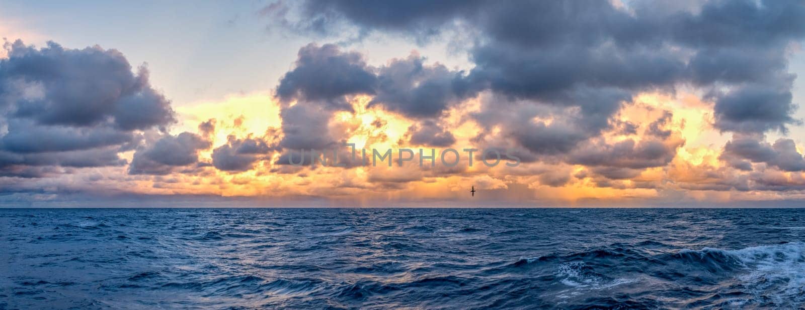 dreamlike sunset panorama on the open wide sea