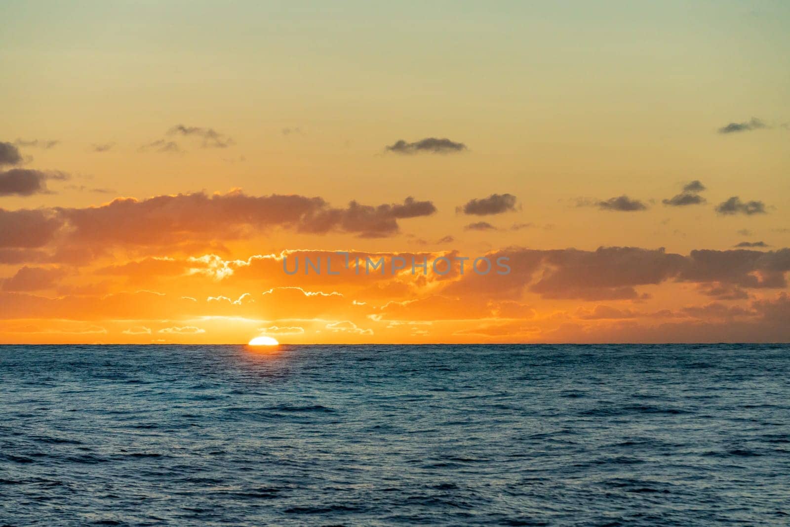 dreamlike sunset panorama on the open wide sea