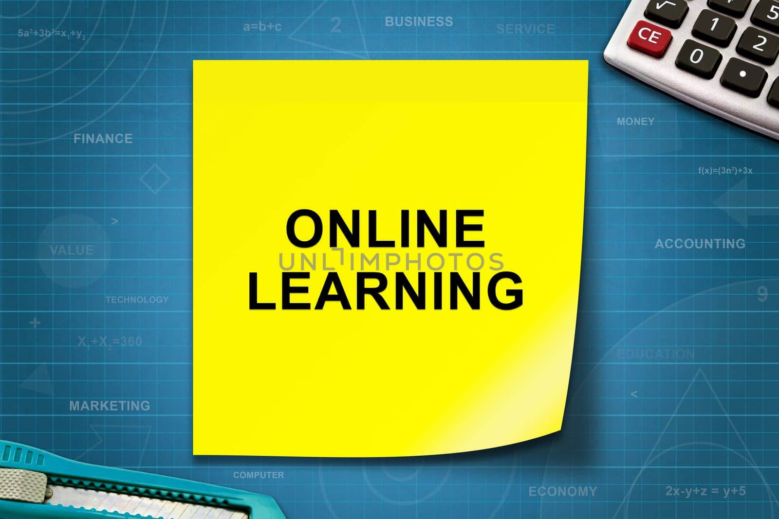 online learning text on yellow note with graph paper