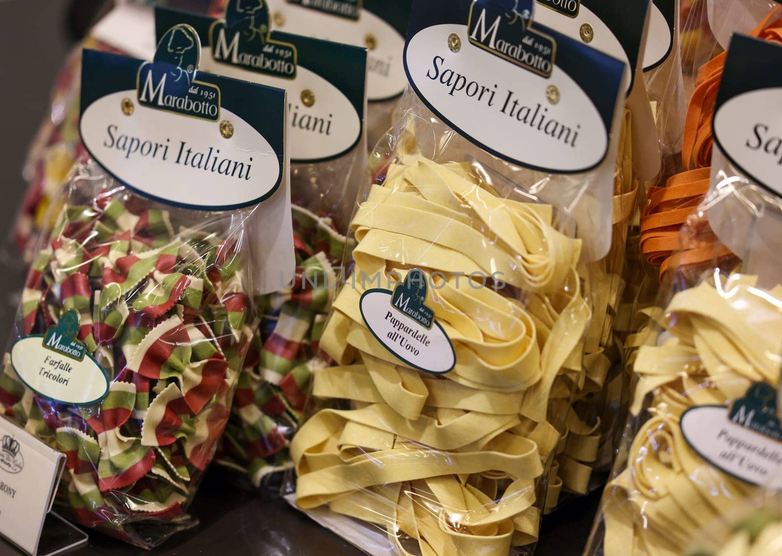 Cracow, Poland - November 5, 2021: Variety of types, shapes and colors of Italian pasta at Enoexpo and Gastrofood - Trade Fair for Food and Drinks for Catering