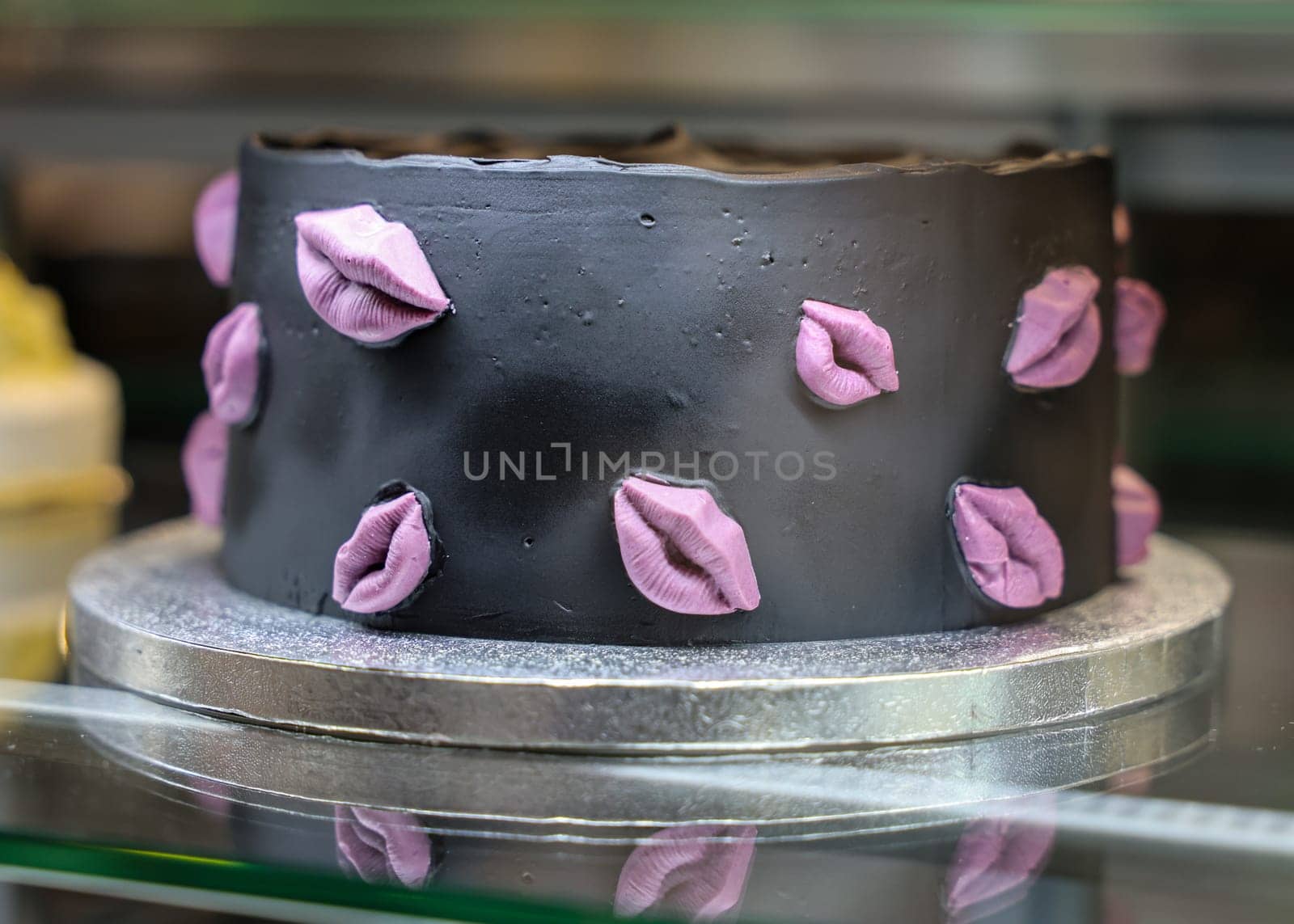 Chocolate cake decorated with sweet pink lips