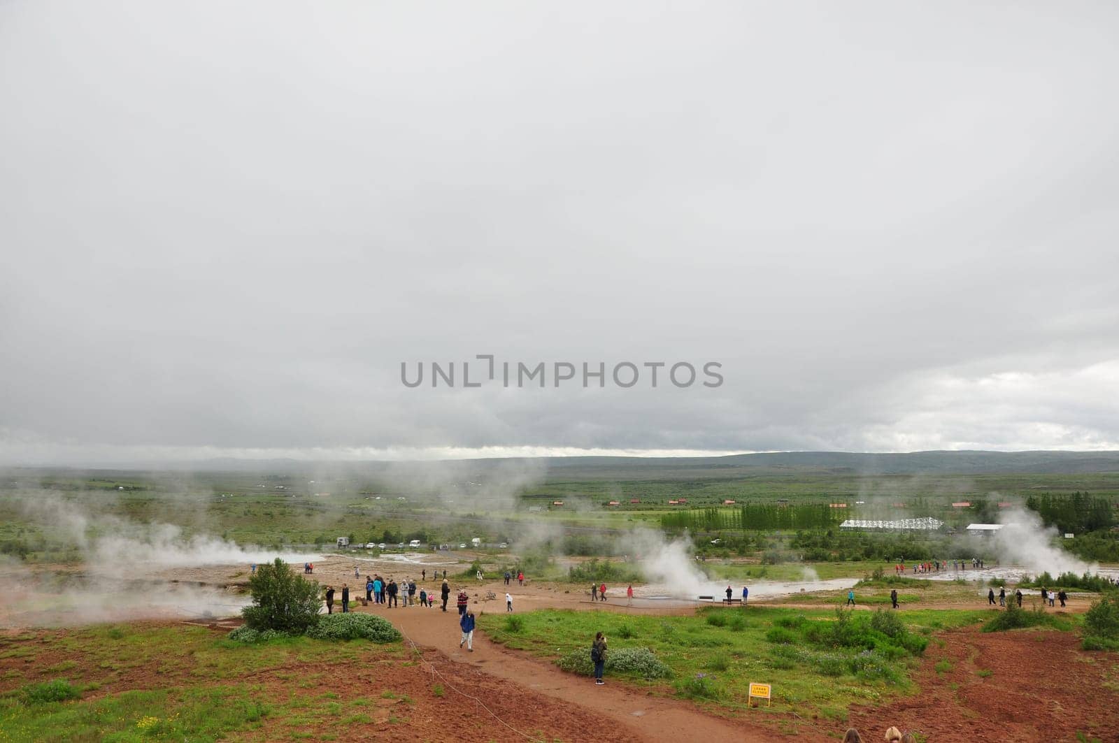 Aerial view of group of people around the Strokkur geyser in Iceland