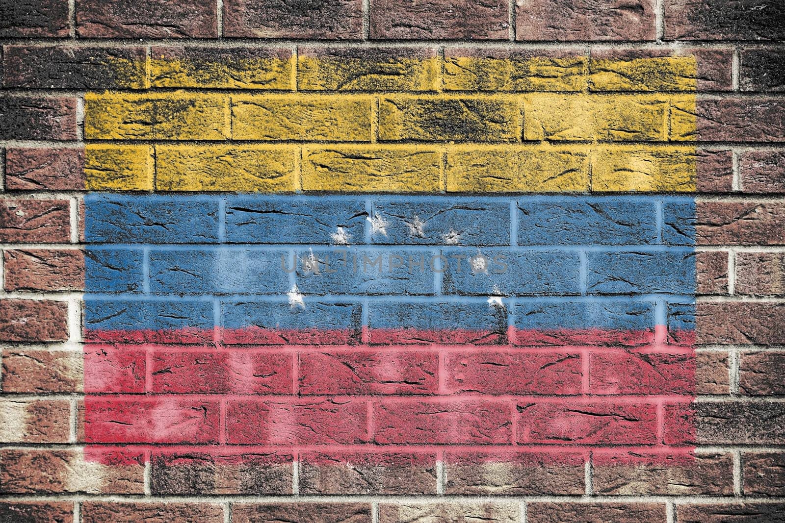 A Venezuela flag on a brick wall background