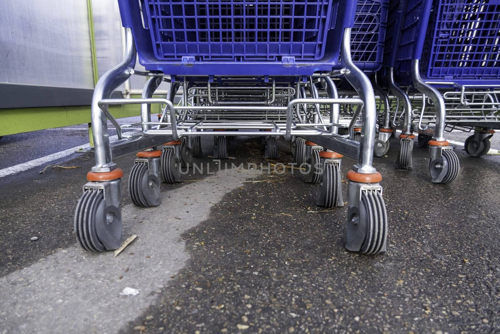 Detail of shopping carts in a hypermarket in the city