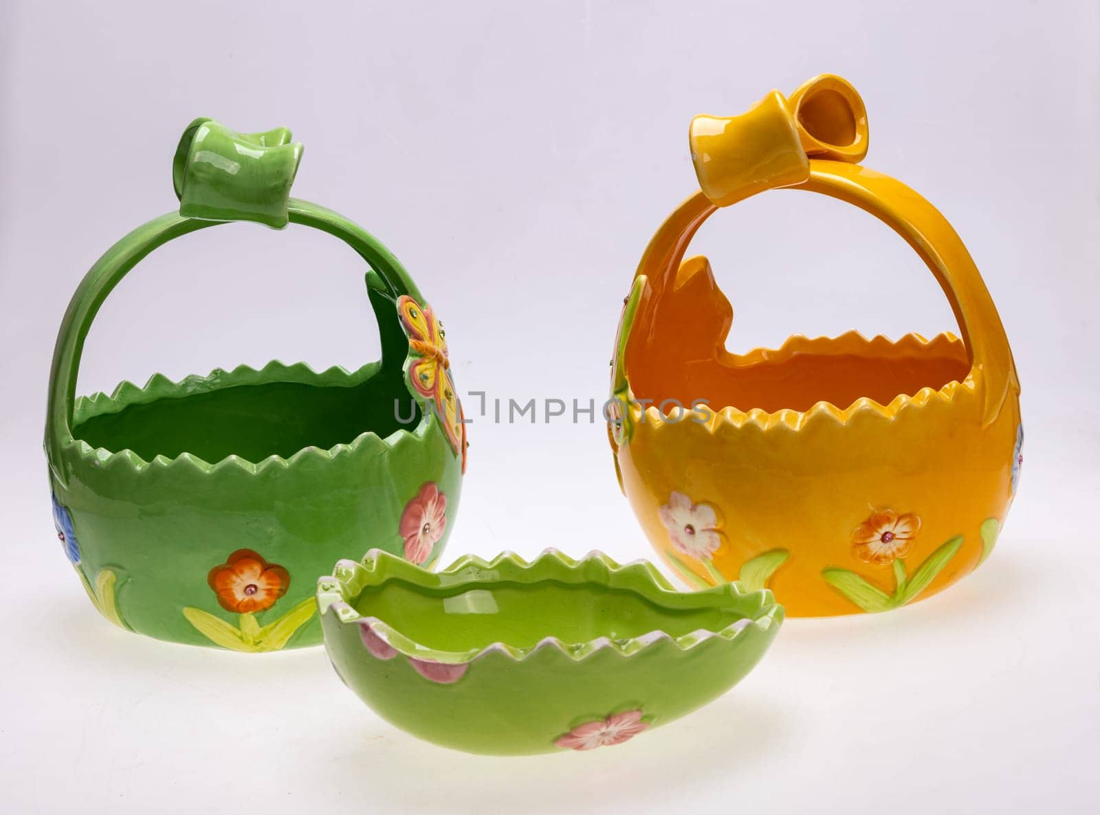 Colorful ceramic Easter decorations with butterfly motifs
