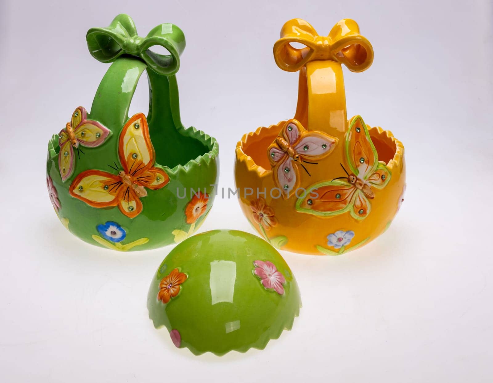 Colorful ceramic Easter decorations with butterfly motifs