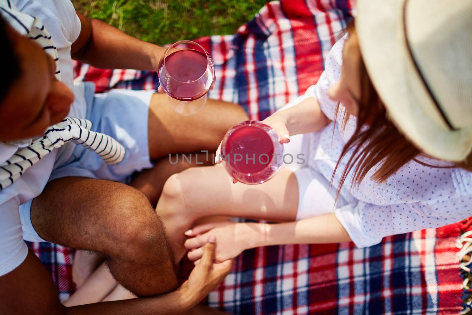 Young couple enjoying weekend with red wine
