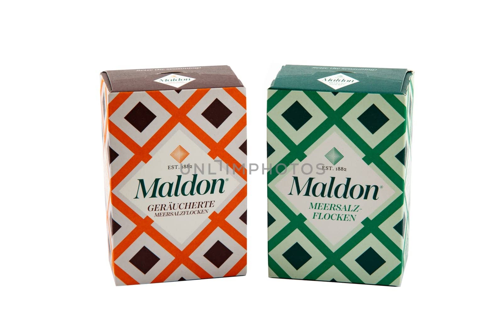 WETZLAR, HESSE, GERMANY 04-06-2023: Two Boxes of Box of MALDON sea salt flakes over bright background
