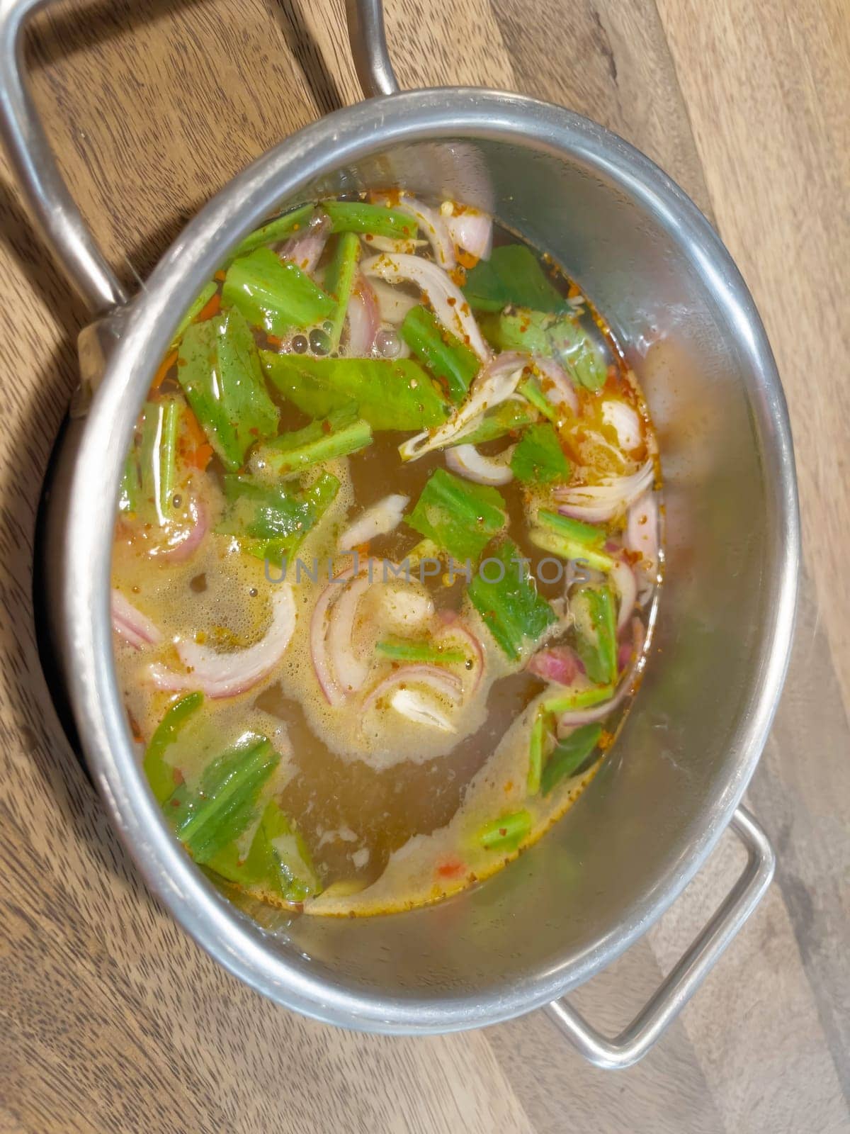 Sour spicy soup in hot pot, stock photo