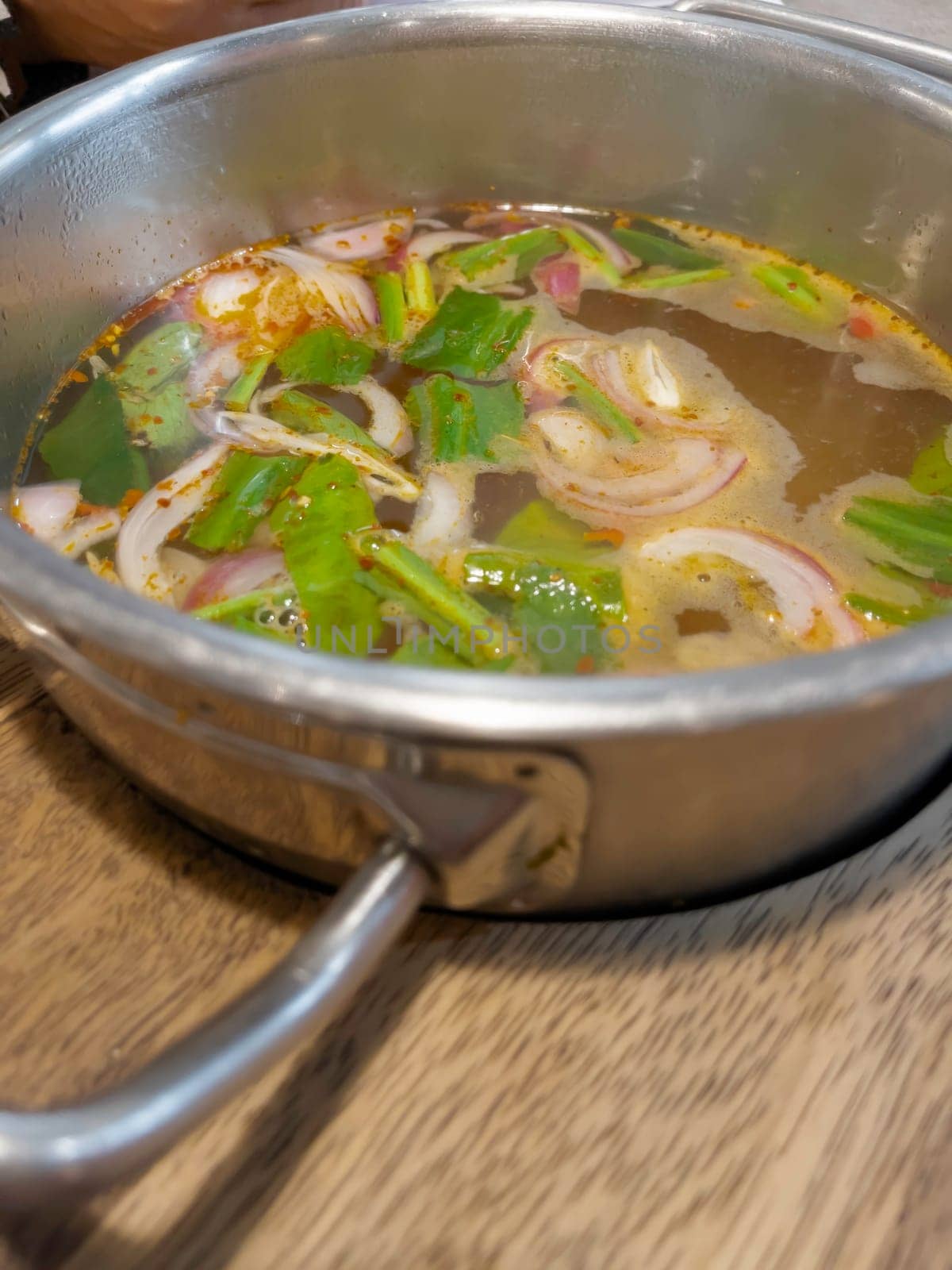Sour spicy soup in hot pot, stock photo