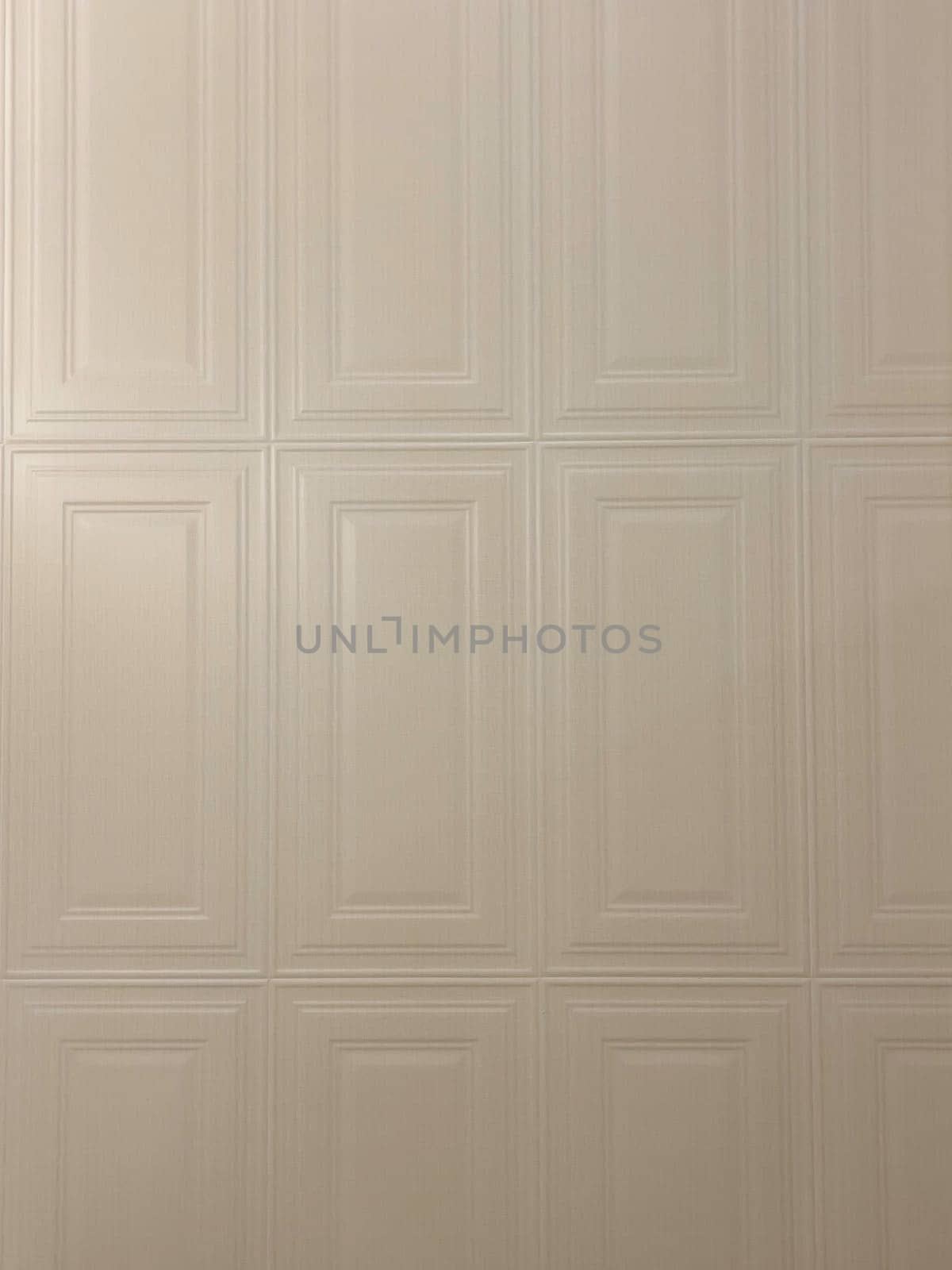 Beige tiles wall surface vintage, stock photo