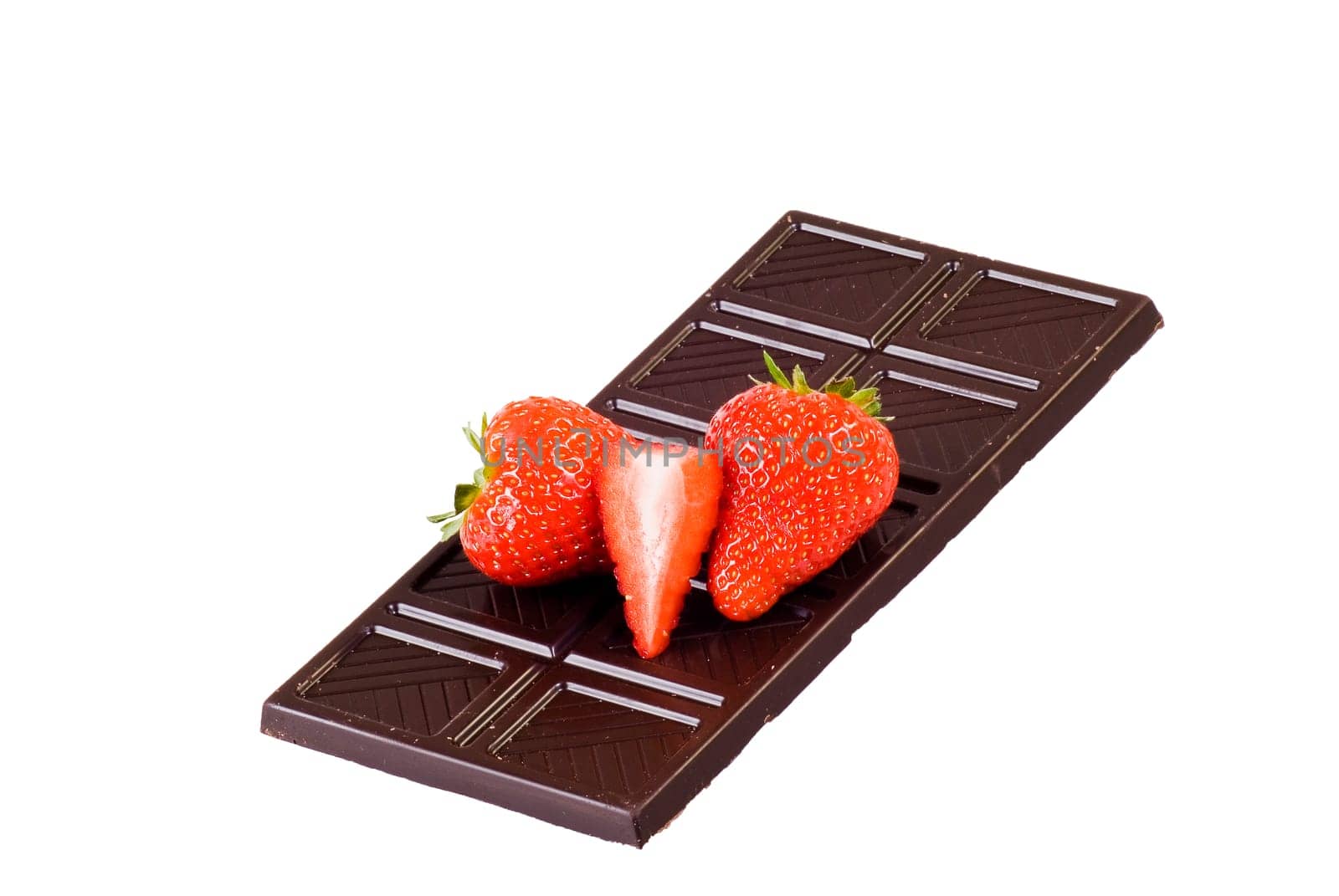 Dark chocolate and strawberries over white background.