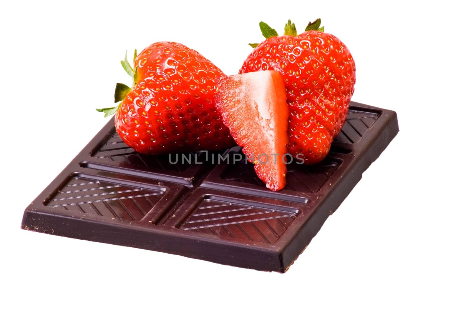 Dark chocolate and strawberries over white background