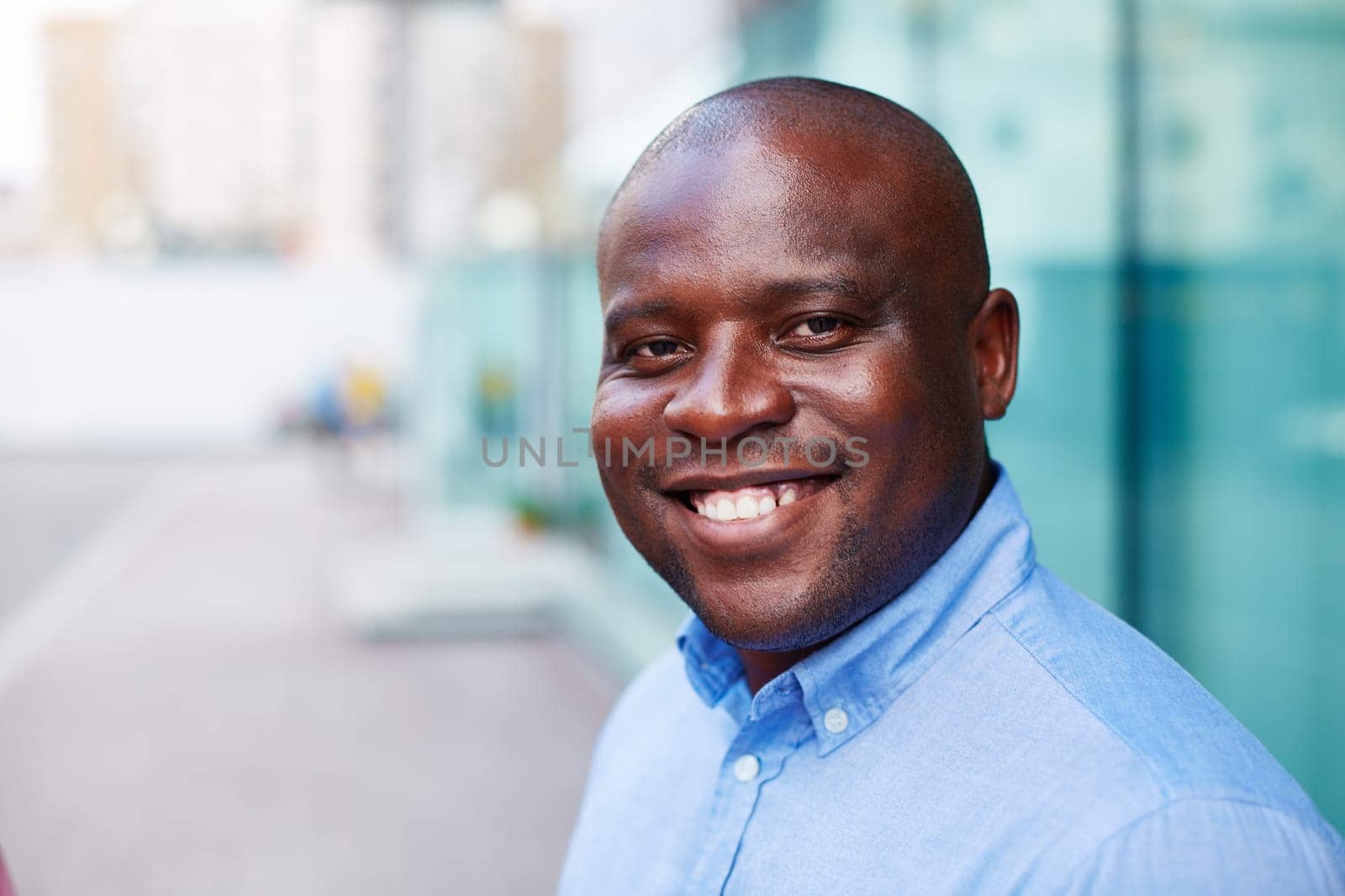 Happy African-american man looking at camera