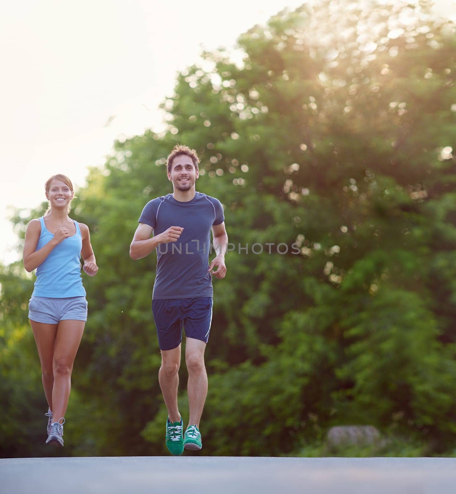 Young couple running together outdoors