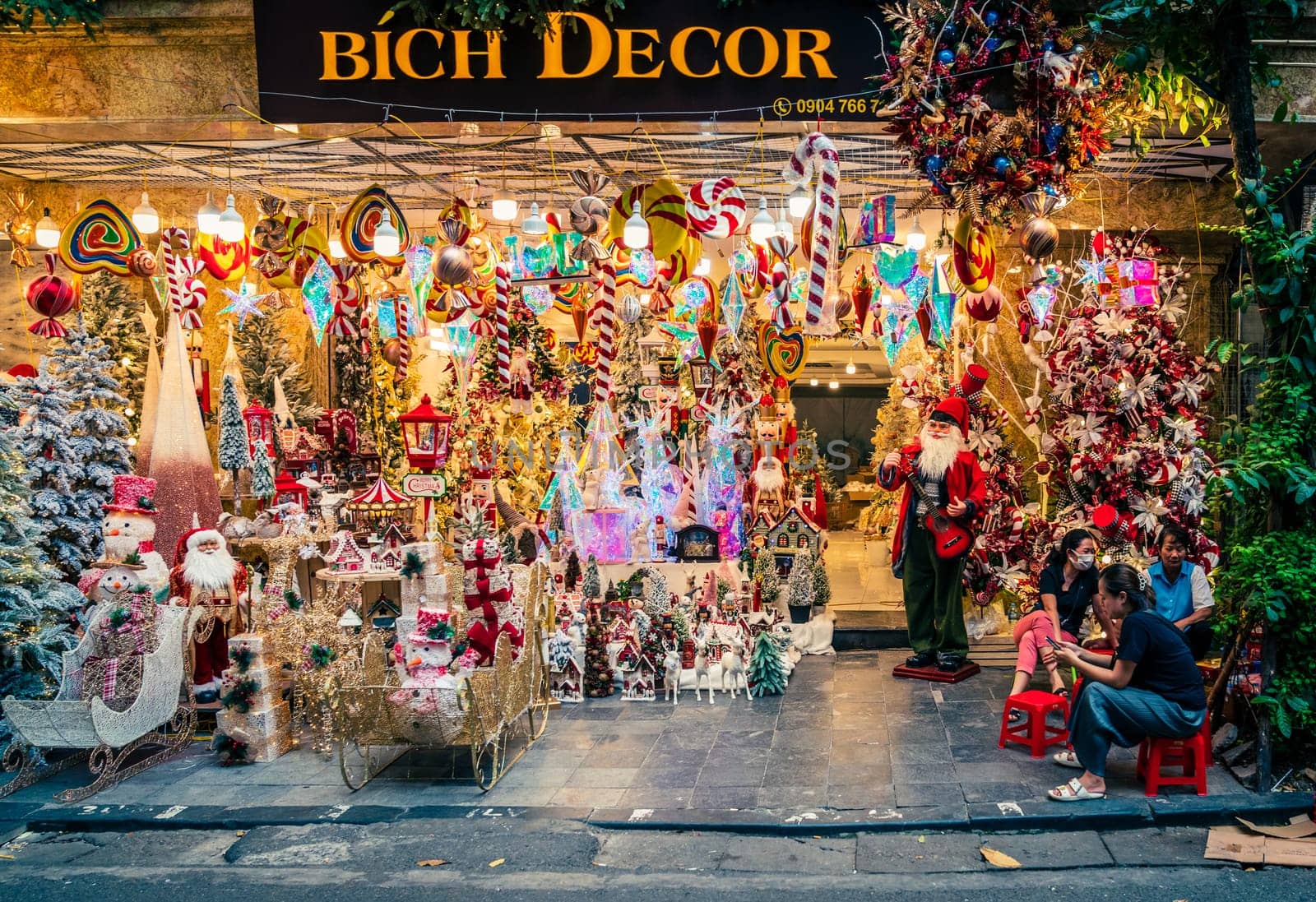 Hanoi, Vietnam, November 14, 2022: Brightly lit display of a Christmas store in French Quarter in Hanoi, Vietnam
