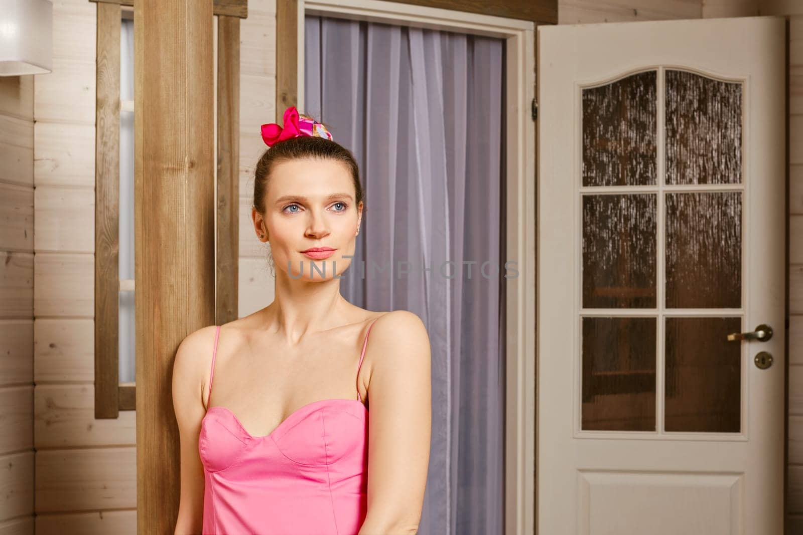 Medium closeup portrait of beautiful adult woman looking to the side as like she is waiting for someone