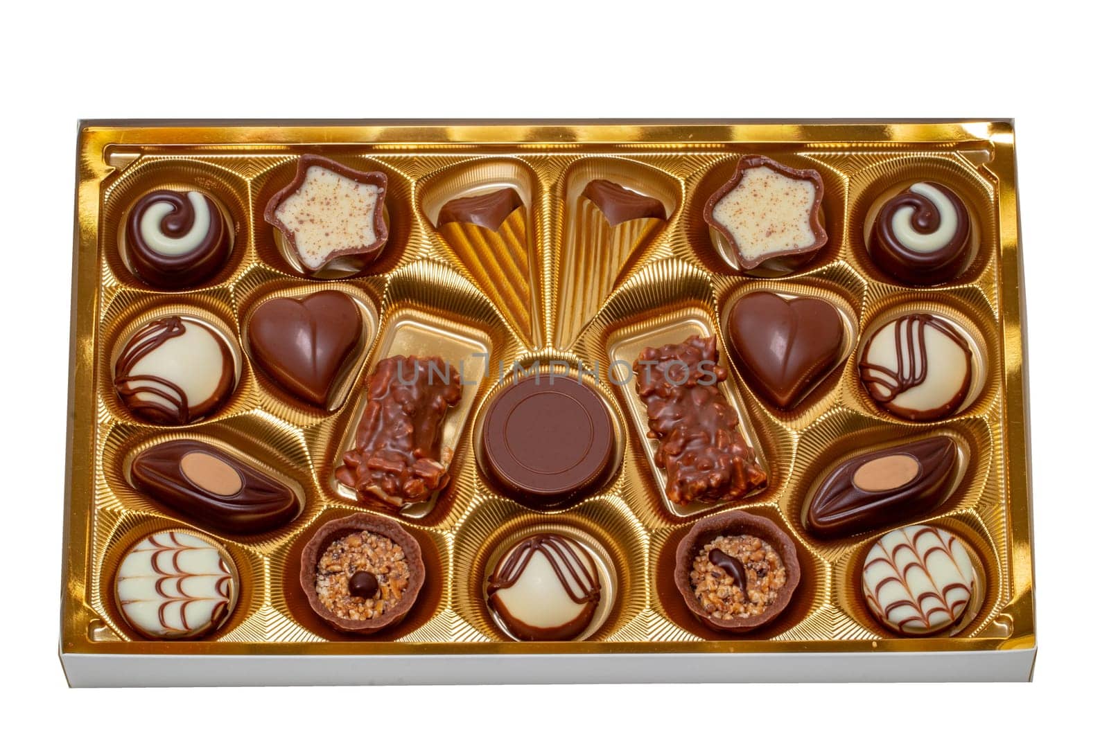 Closeup of box of fine chocolate candies in a beautiful plastic box isolated on a white background. Surprise gift for Valentine's Day, mothers day, birthday or other festivals.