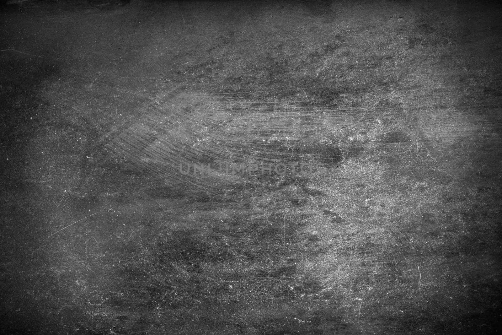 Close up of a black concrete background.