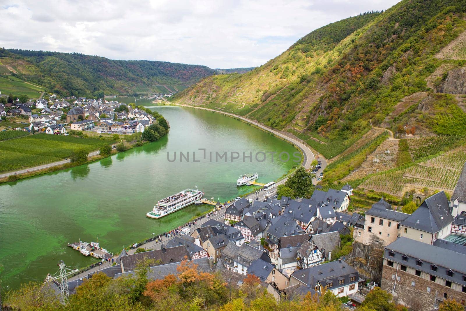 Aerial view of the Moselle valley with vineyards, the river Moselle and the villages Ellenz-Poltersdorf and Poltersdorf seen from castle Metternich in Beilstein, Rhineland-Palatinate, Germany.