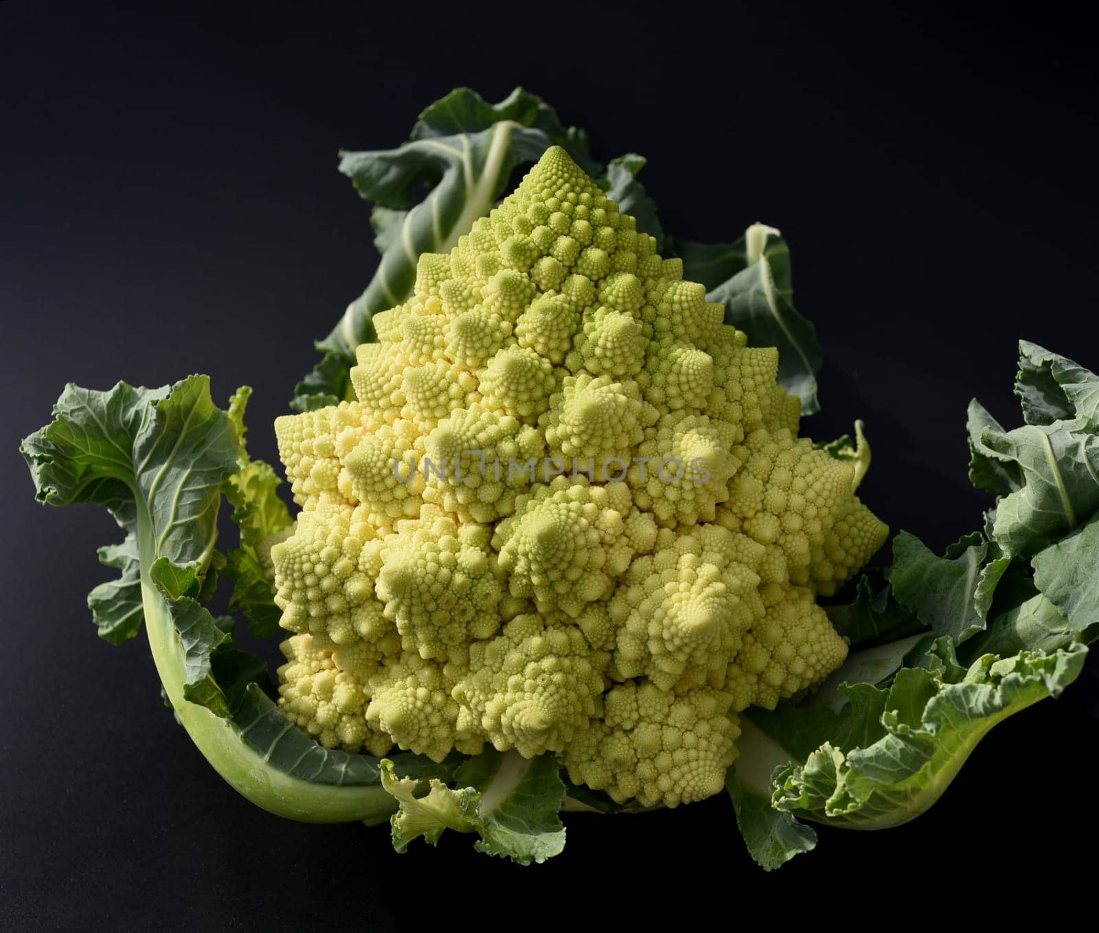 Romanesco,broccoli has large green flowers with excellent taste and decorative appearance. Romanesco,broccoli has large green flowers with an excellent taste and decorative appearance.