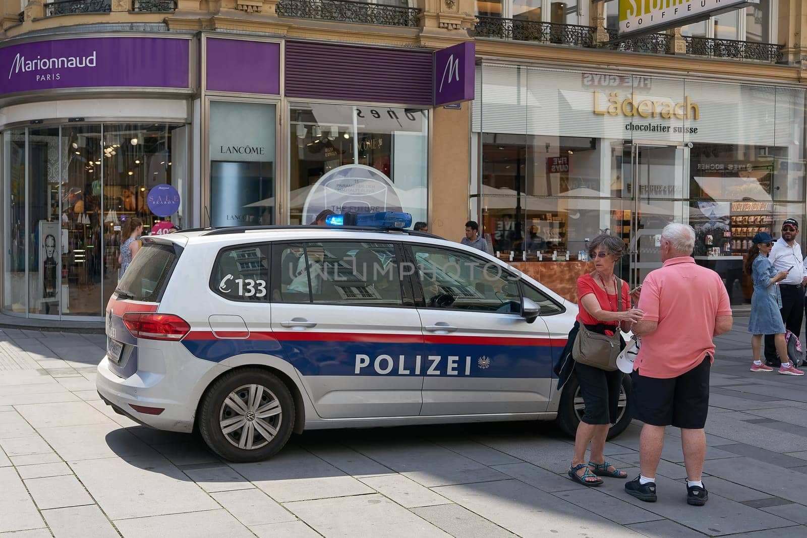 Police car during a police operation in a shopping street in the center of Vienna in Austria