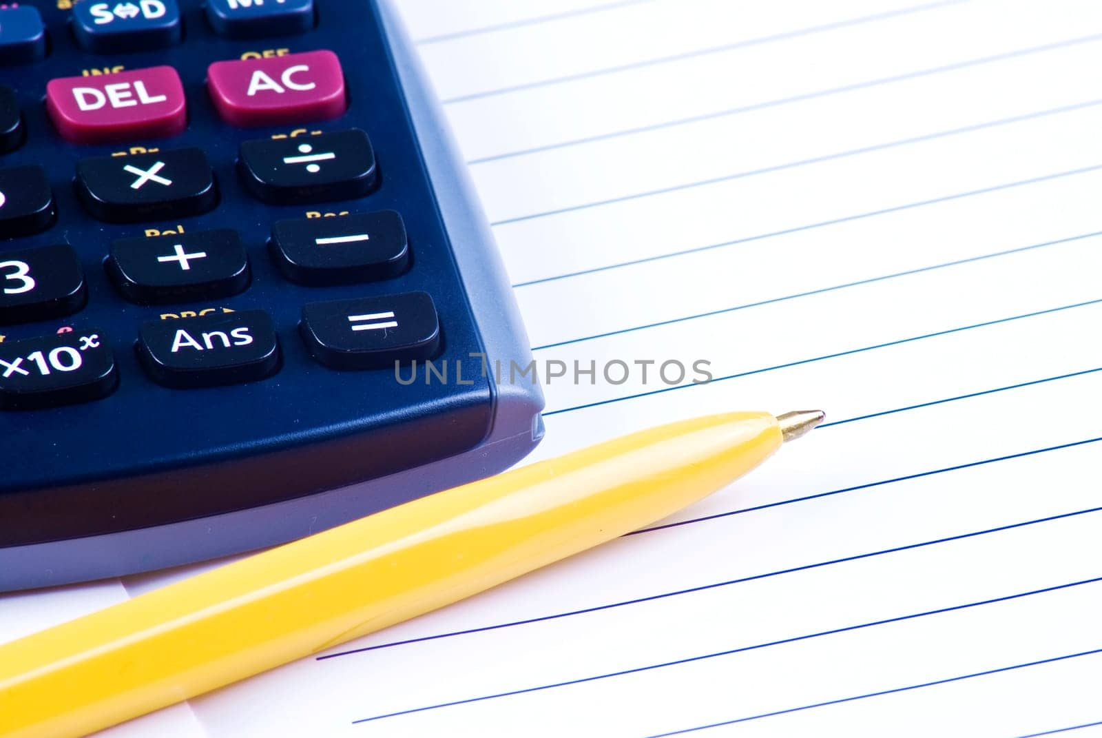 Calculator with notebook and pen
