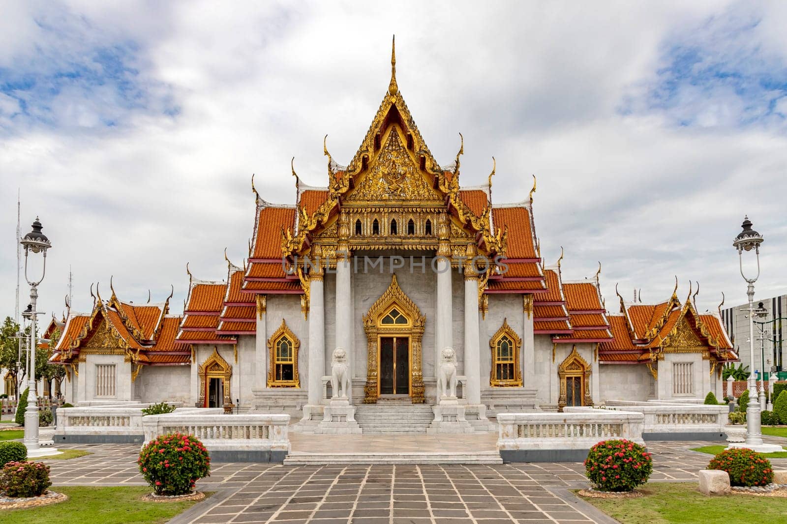 Wat Benchamabophit Dusit Wanaram (This temple is known as the Marble Temple) in Bangkok, blue sky and clouds. One of the most beautiful temples in Thailand Favorite destination in Bangkok. Daytime.